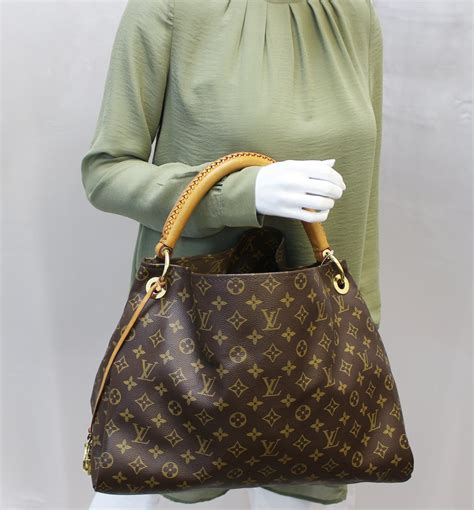 louis vuitton artsy monogram bag.